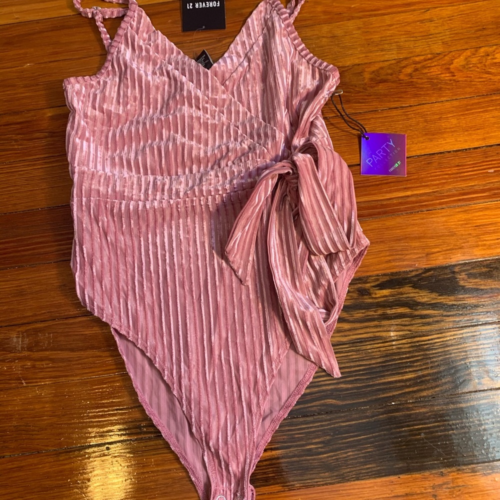 Pink body suit